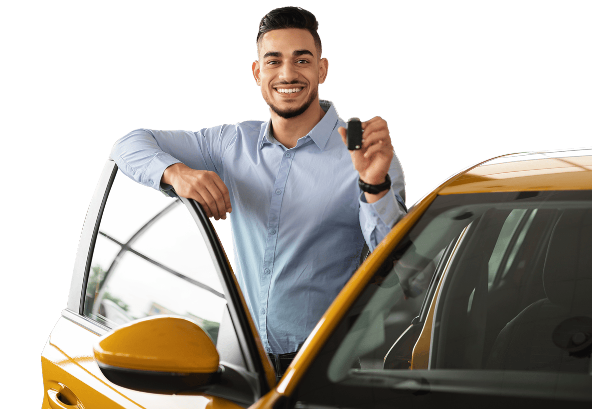 man standing with car key next to open door of yellow car